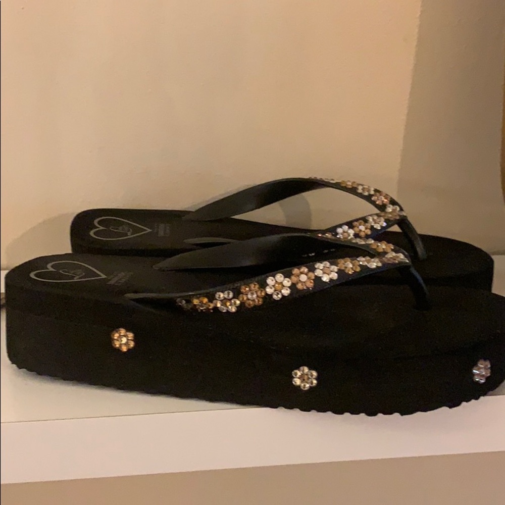 Lady Landell’s Swarovski crystal flip flops